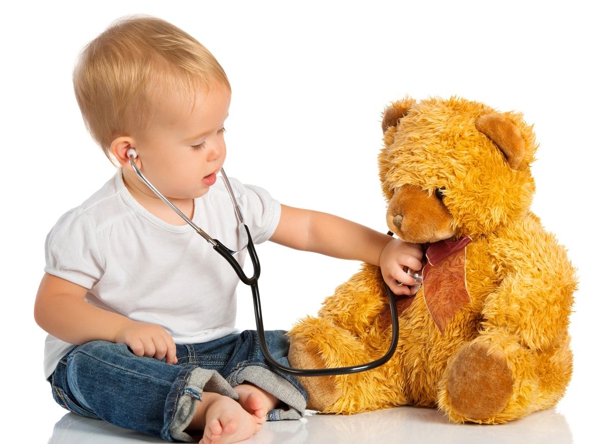 baby w/stethoscope on teddy bear